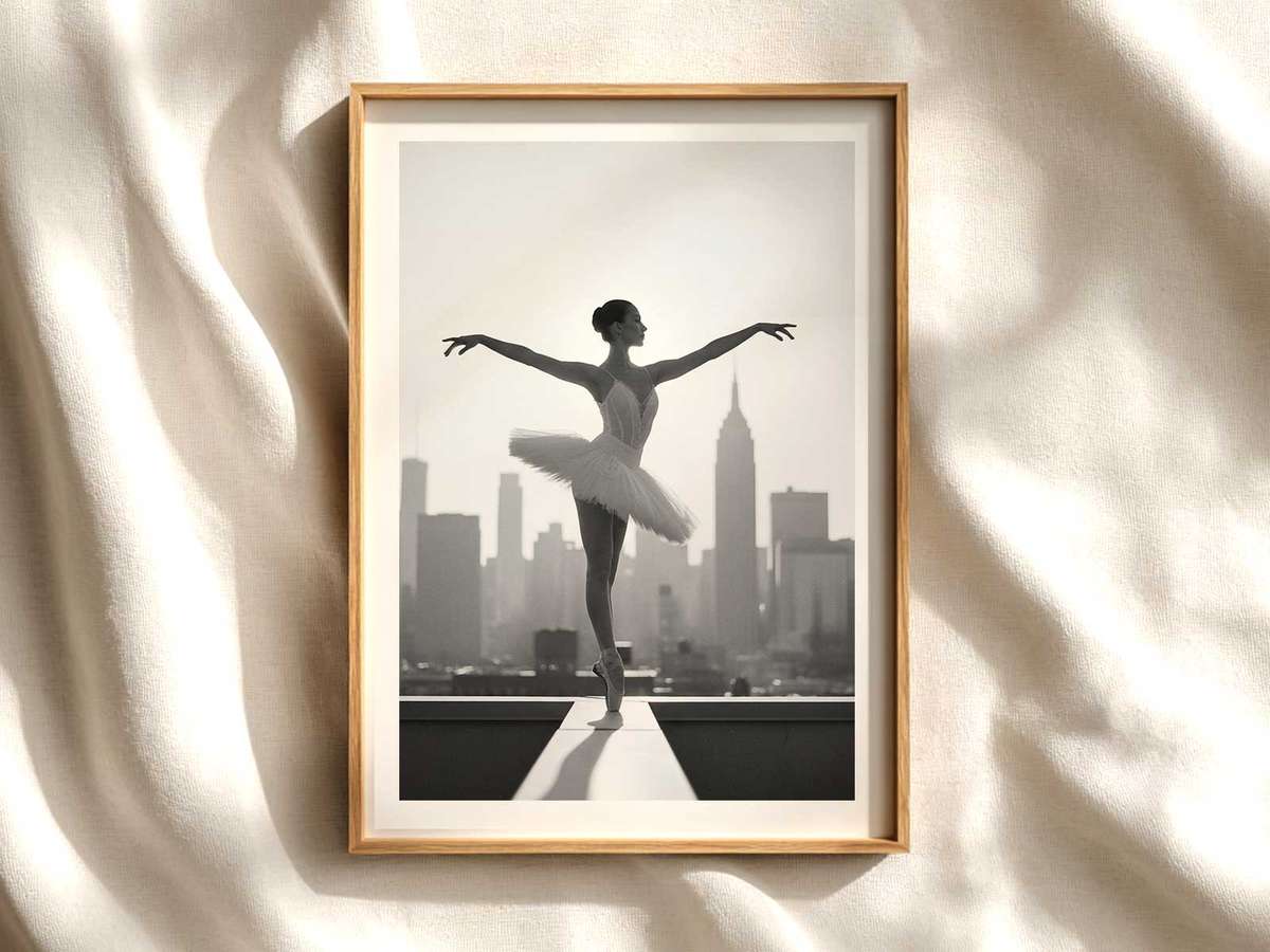 Solitary ballerina silhouette poised on a rooftop against a soft urban skyline at dusk