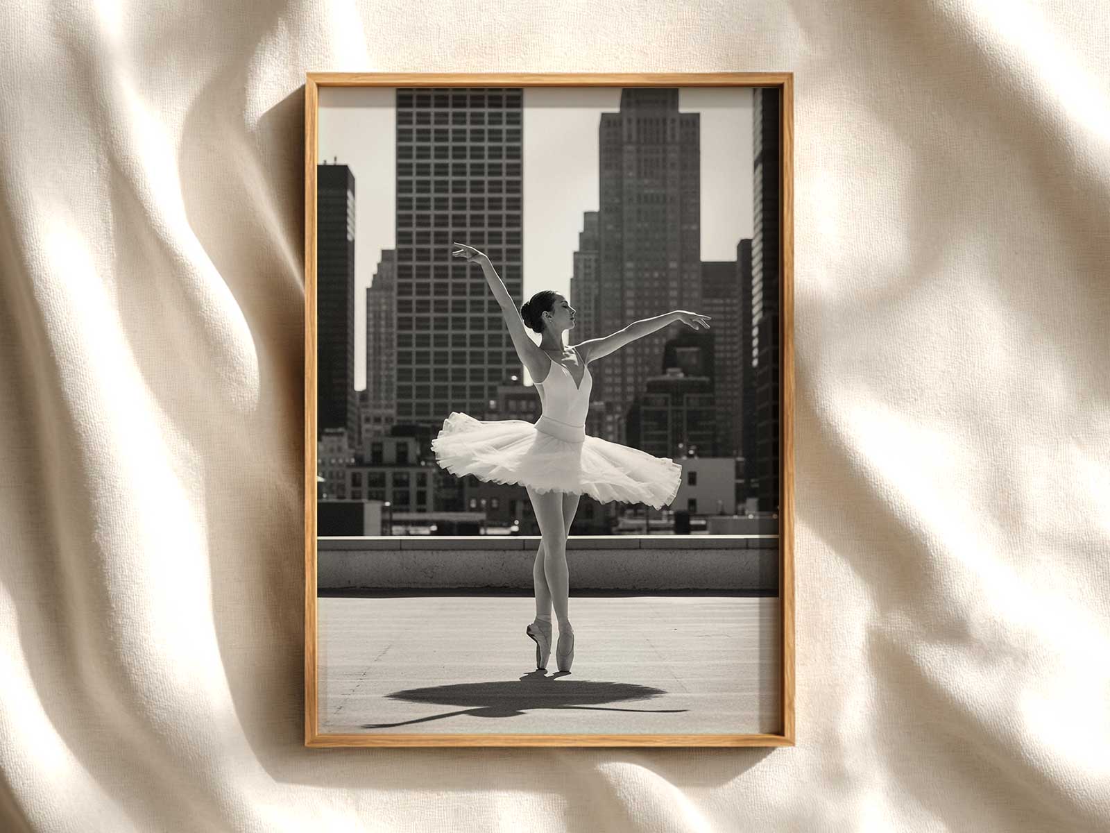 Side profile of a dancer demonstrating precise port de bras with soft hand placement and elongated neck