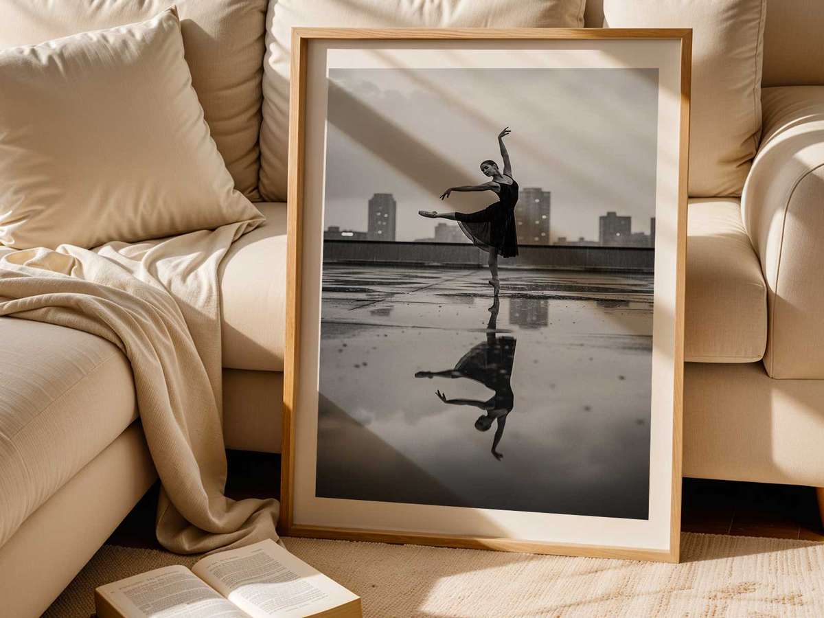 Ballerina with an elongated line contrasted against angular city architecture, head gently lifted in quiet confidence