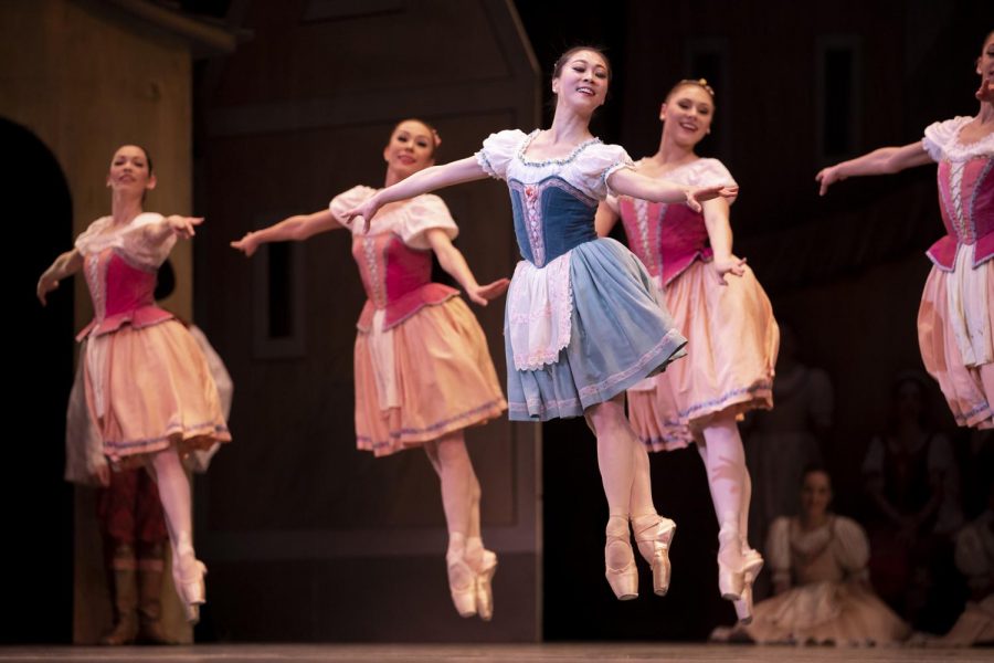 Open pages of Léo Delibes's orchestral score for Coppélia showing melodic lines and instrumentation notes