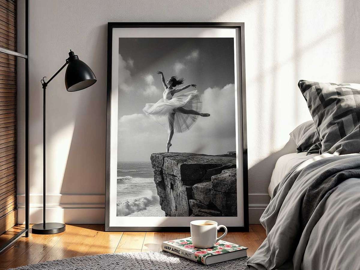 Two dancers performing a delicate duet on a clifftop, one supporting the other above the void with focused stillness