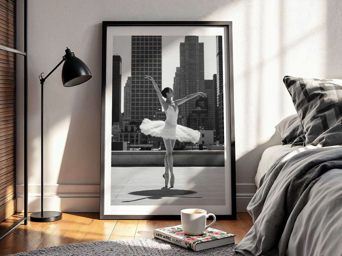 Three-quarter view of a dancer with flowing sleeves, captured mid-gesture to show motion that complements classical line