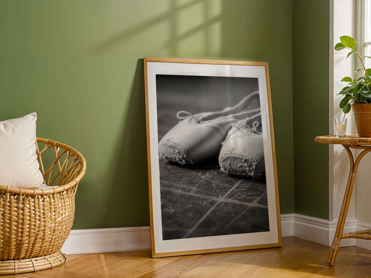Geometric composition of a leg and pointe creating a clear visual rhythm