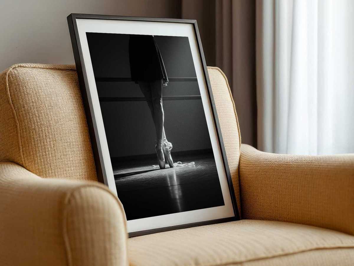 Close-up of Natalia Makarova en pointe demonstrating a seamless classical line from foot to arm, elegant profile visible