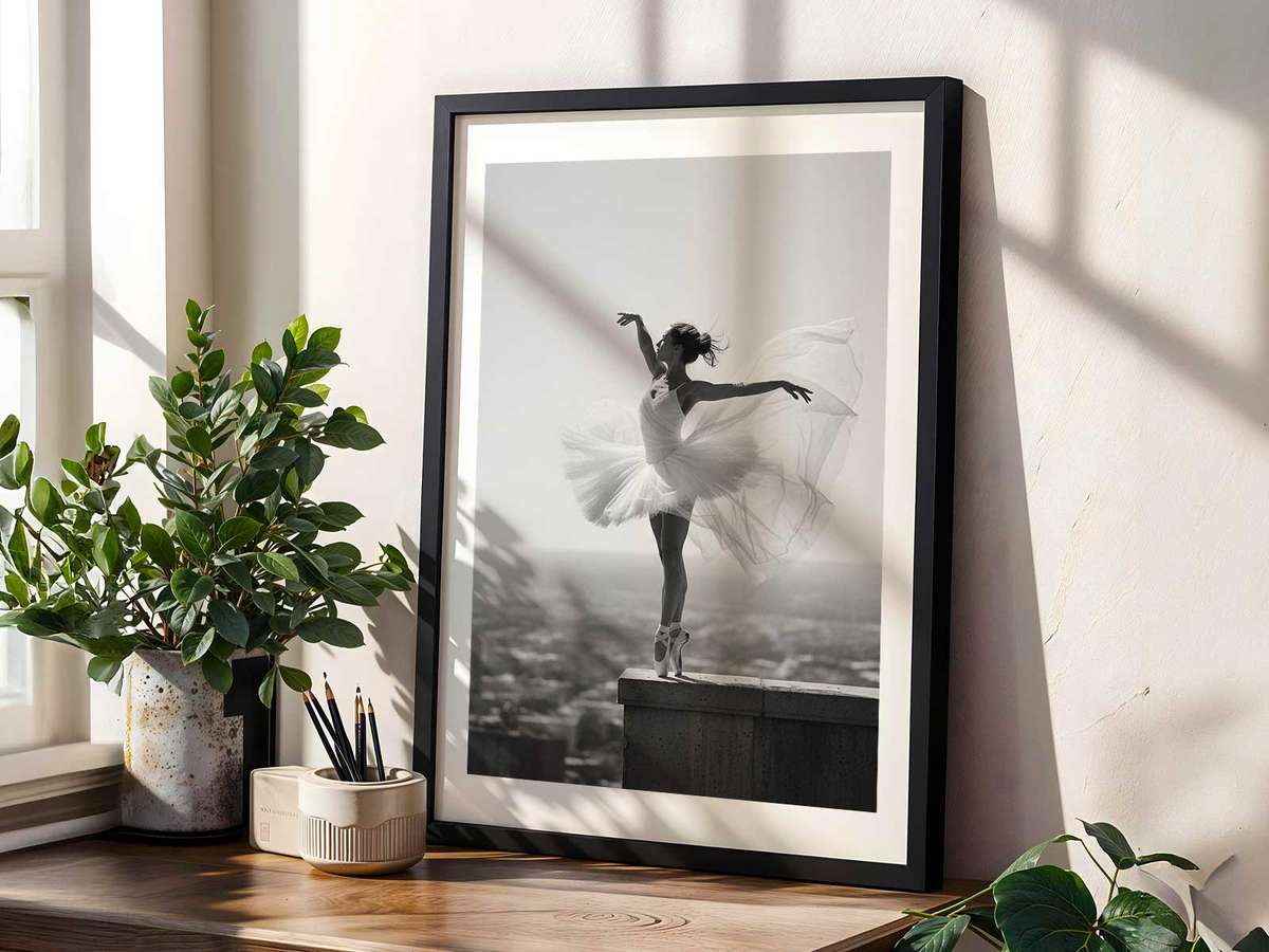 Silhouette of Misty Copeland en pointe framed by a doorway, light delineating the line of her body