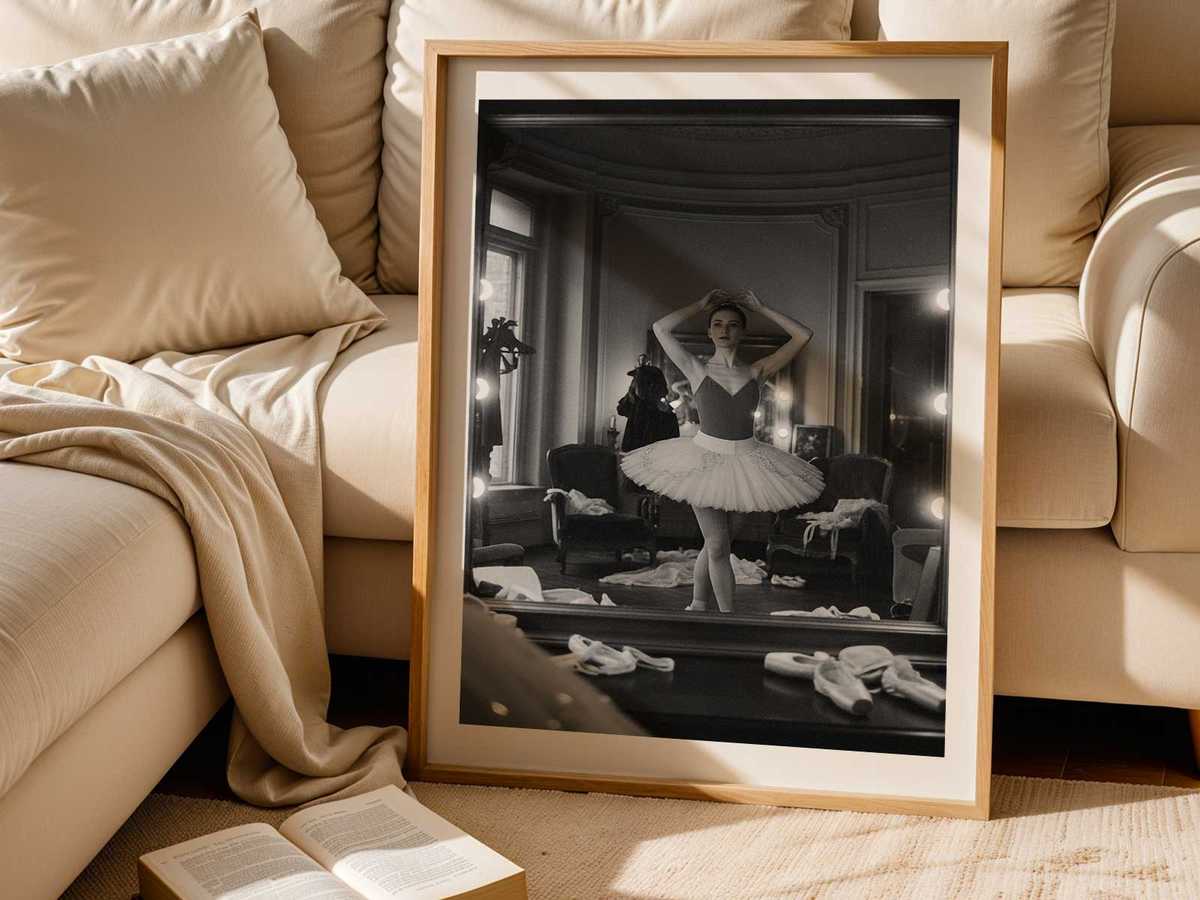 Two images of the same dancer in mirrored plié forming a symmetrical contrast of body and reflection