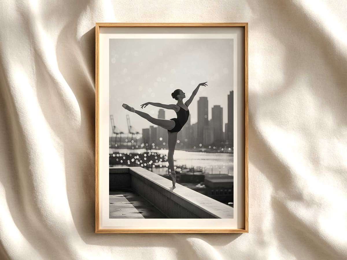 Ballerina posed by a large warehouse window with softened sunlight filtering in, highlighting her tutu and the textured…