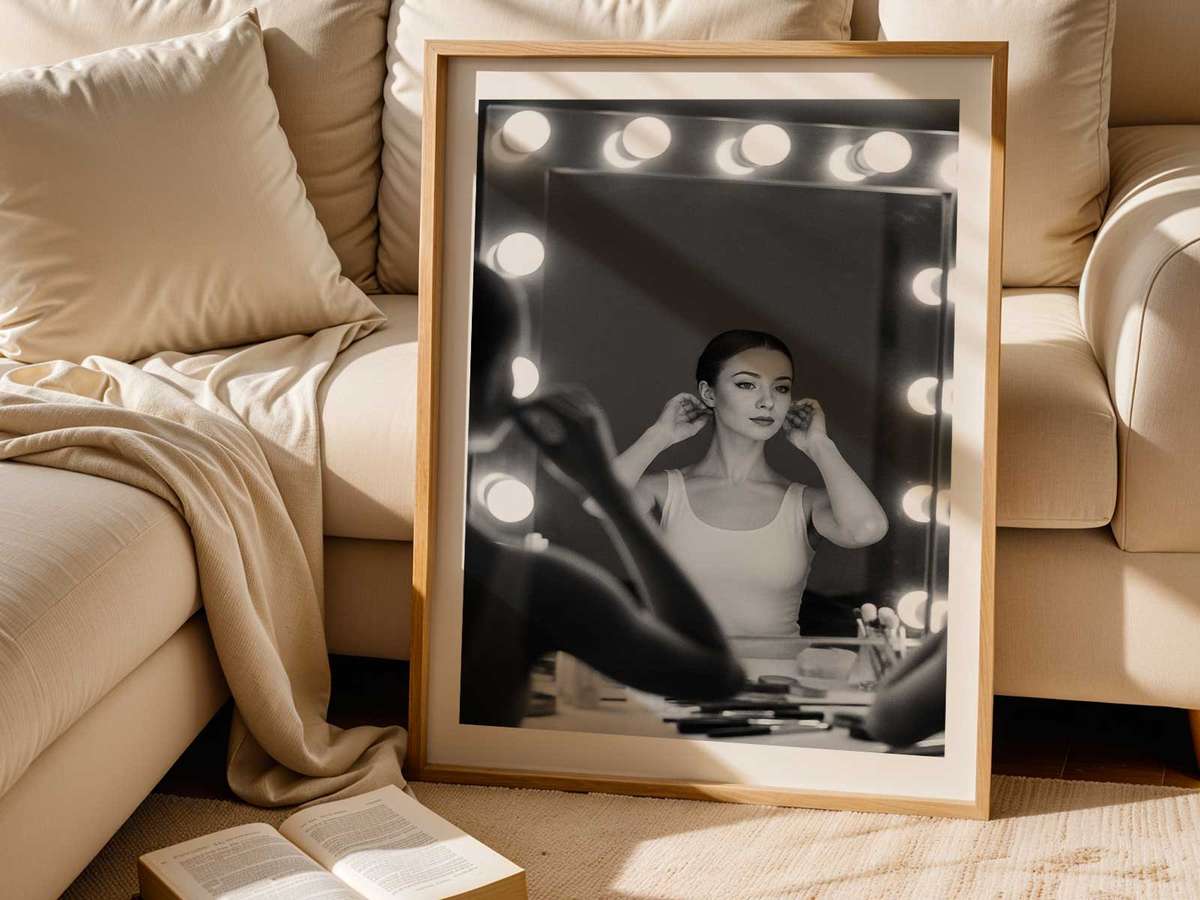 Ballerina mid-rehearsal reflected in a studio mirror, sweat and determination visible in both views