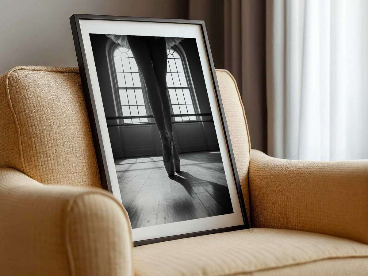 Portrait of a ballet dancer in a rehearsal studio, gaze steady and shoulders soft, captured in natural light