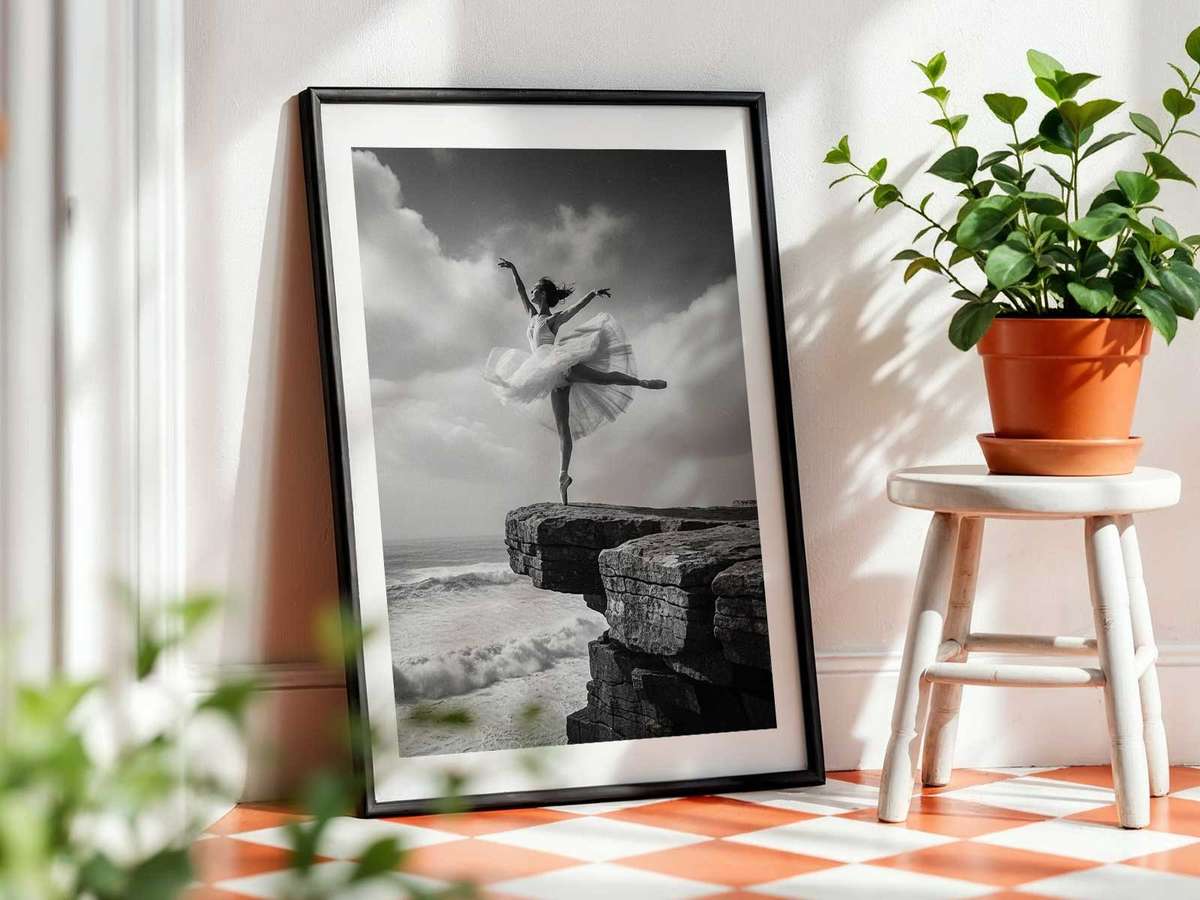 Ballet dancer in an adagio pose beside a tide pool, reflected light and textured rock framing the figure