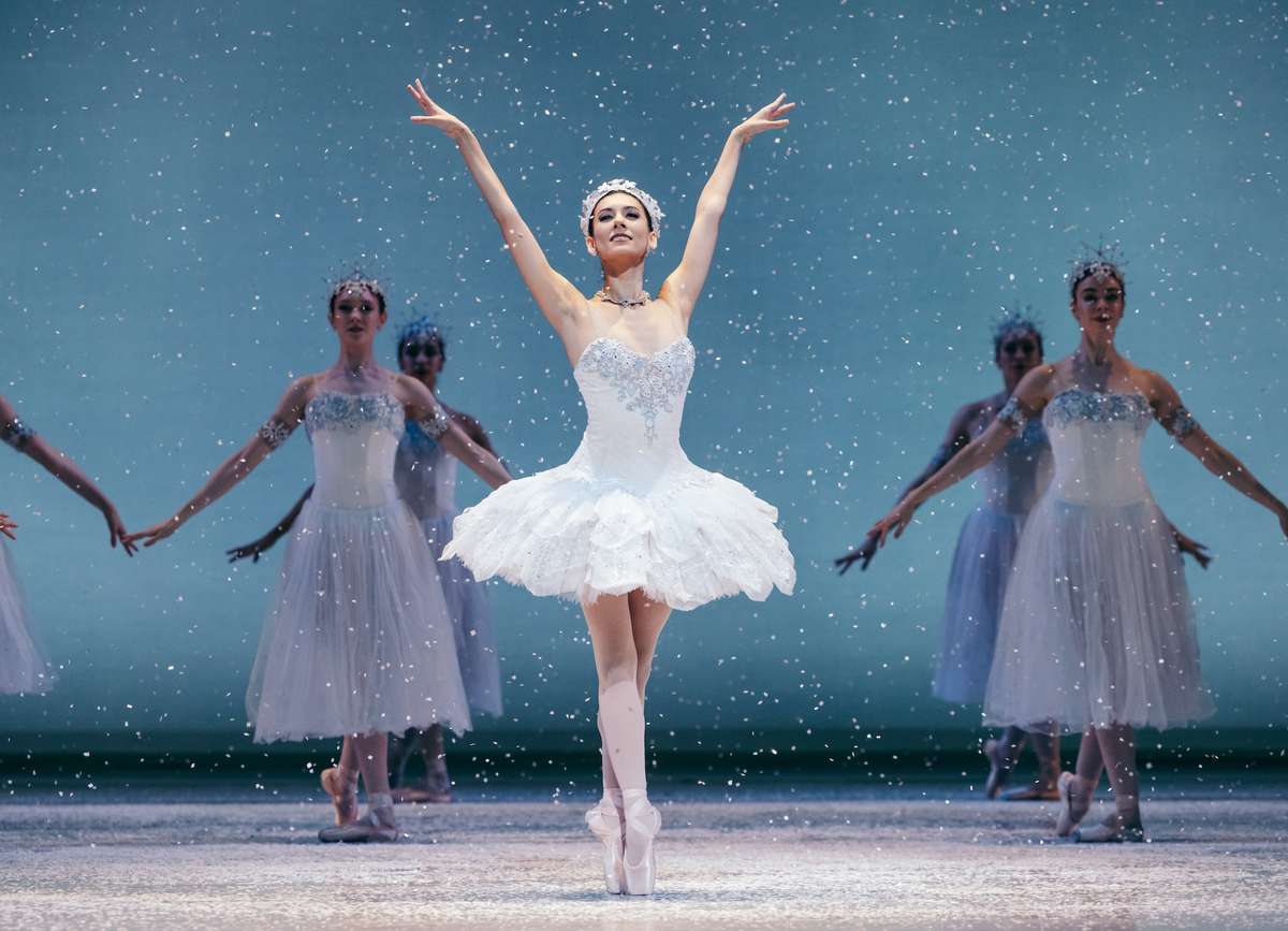 Choreographer and dancers in contemporary costume rehearsing a new premiere at San Francisco Ballet studio
