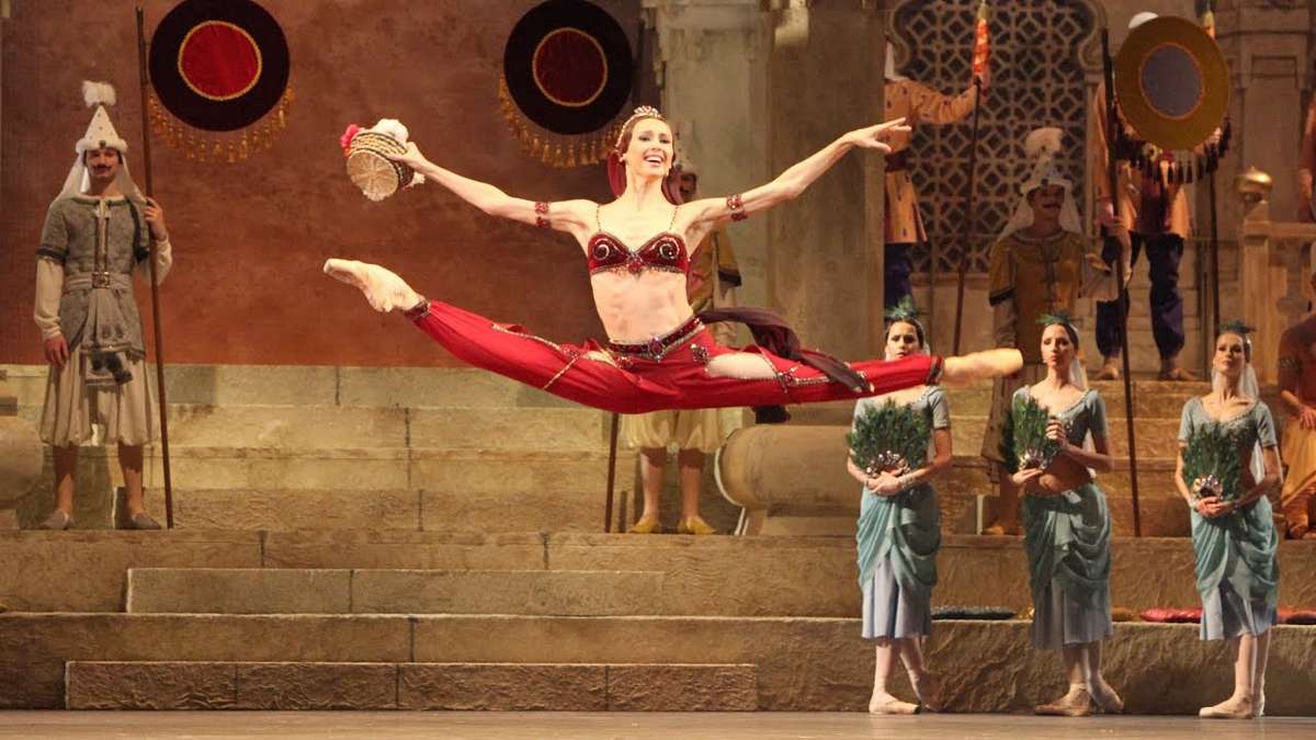 Svetlana Zakharova executing a classic variation at the Mariinsky Theatre, demonstrating refined port de bras and…